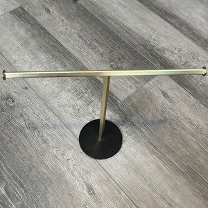 Gold necklace stand